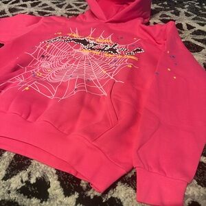 Vibrant Pink Hoodie with Graphic Design
